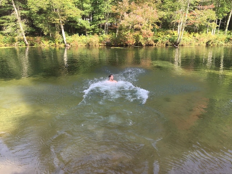 Swimming in river during outdoor adventures in Western Massachusetts