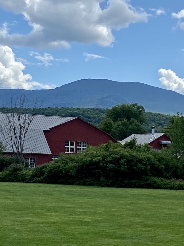 Green Mountain view with red barn-Outdoor Adventures in Stowe