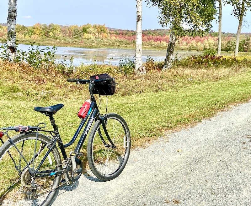Bicycle on trail with water in background