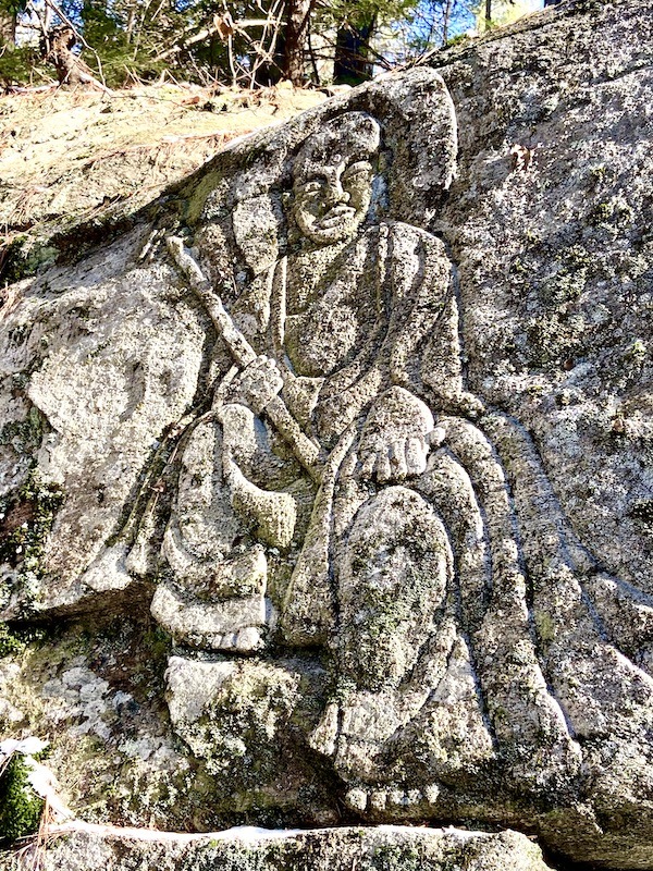 stone carving on an outdoor spiritual retreat