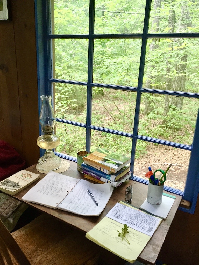 desk in cabin on an outdoor spiritual retreat