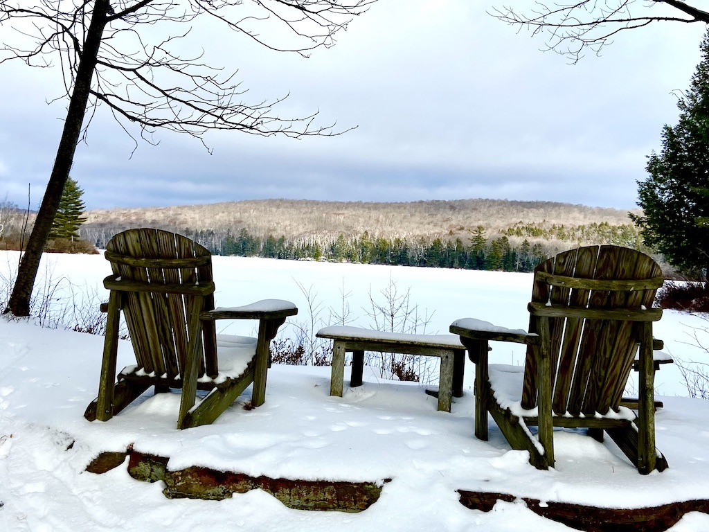two chairs overlooking a lake-free cross country skiing near Hanover, New Hampshire