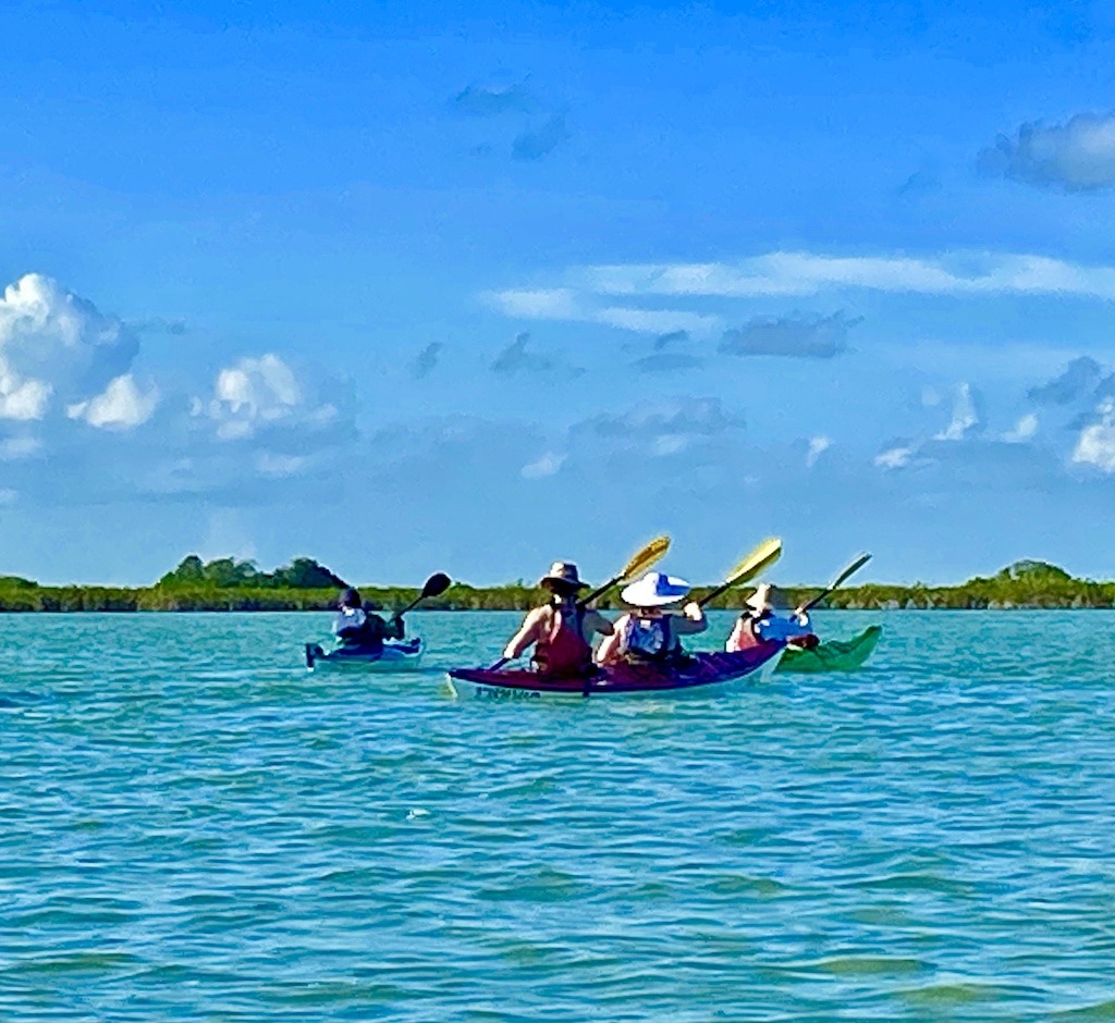 Paddlers sea kayaking Sian Ka'an