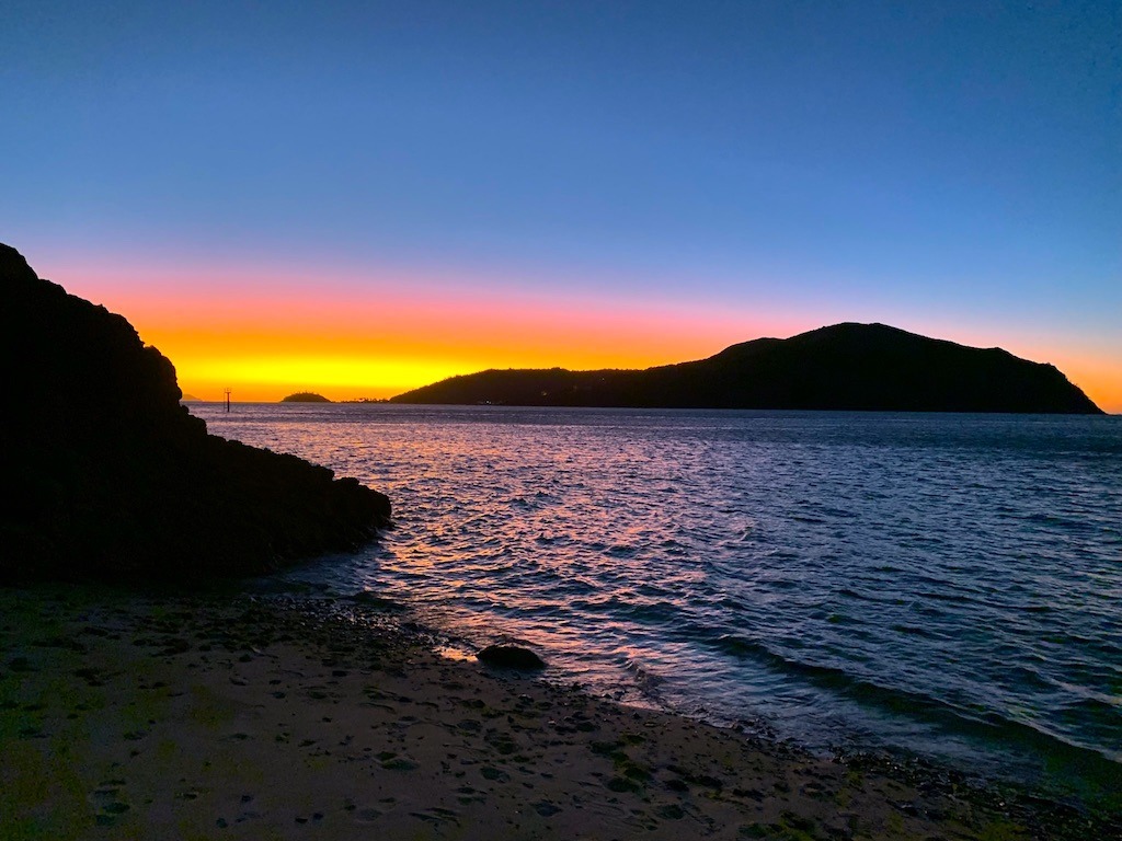 Sunset while Sea kayaking in the Whitsunday Islands.