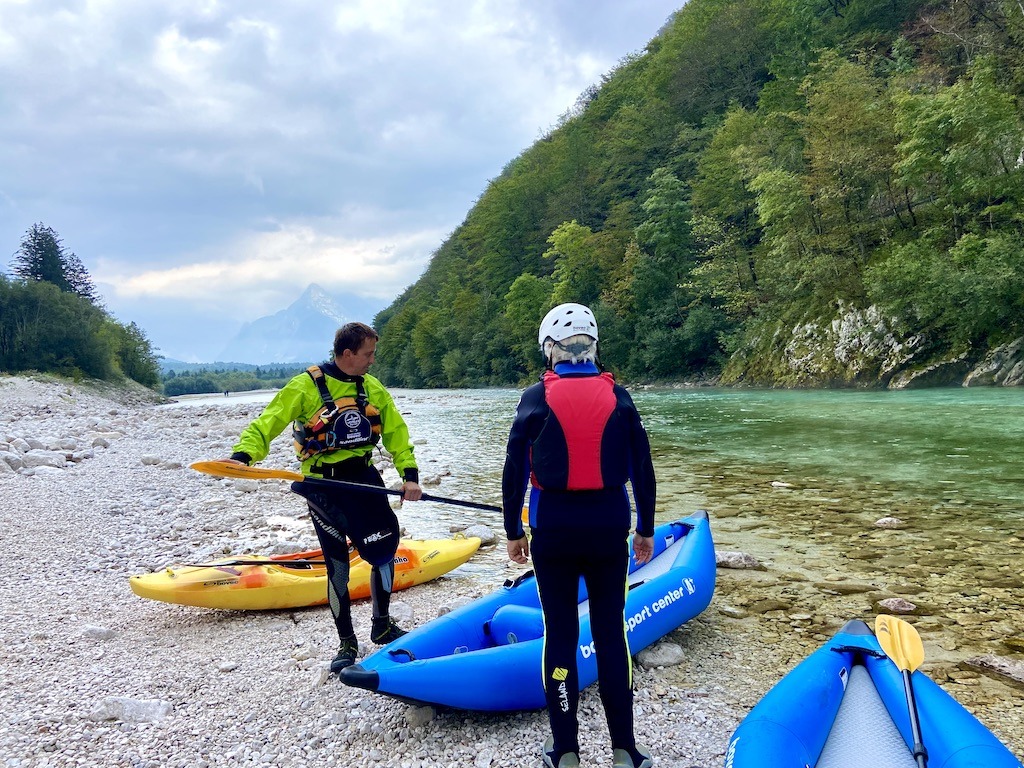 showing how to paddle before kayaking on the Soca River