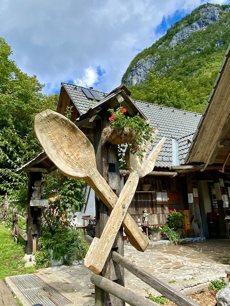 hut with huge wooden spoon and fork