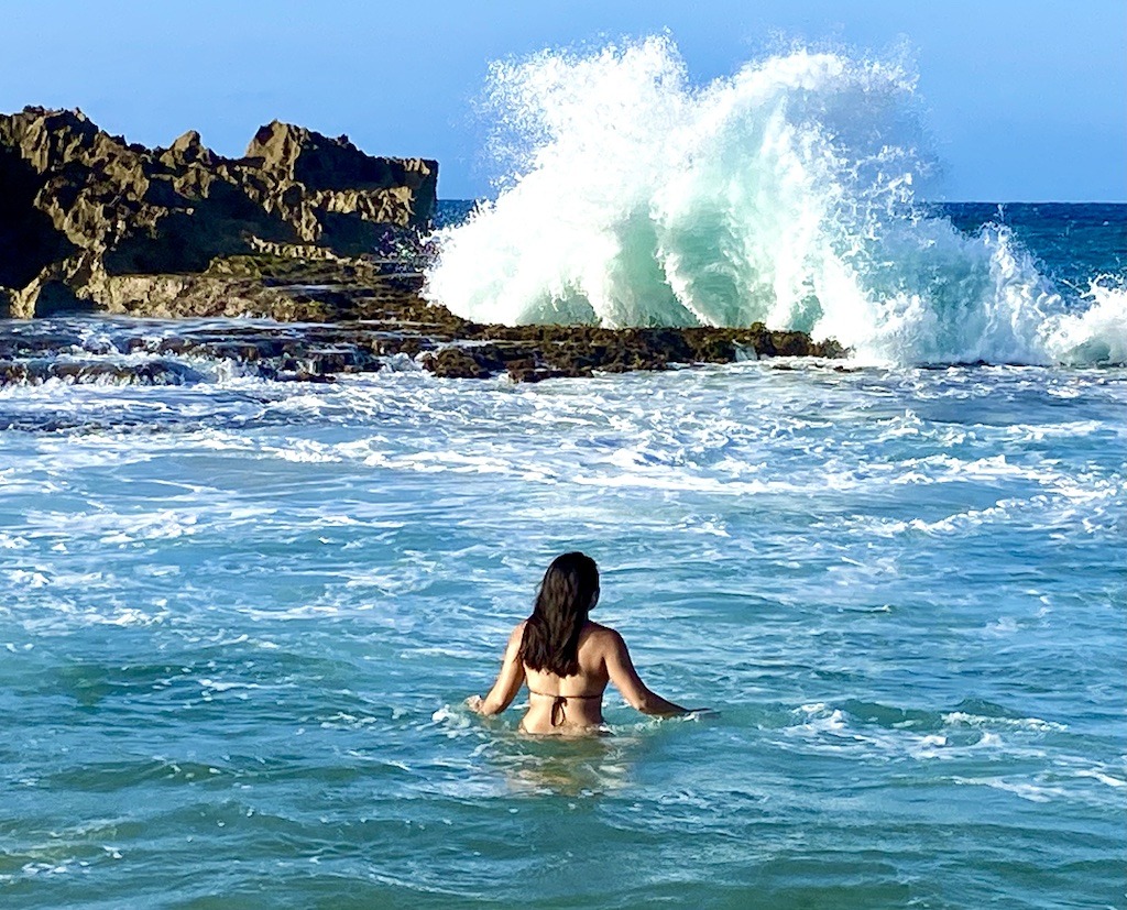person in ocean with wave crashing-Outdoor Adventures Arecibo