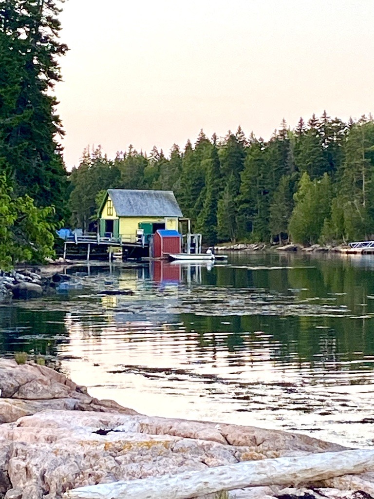 yellow shed on ocean-Downeast Maine outdoor adventures