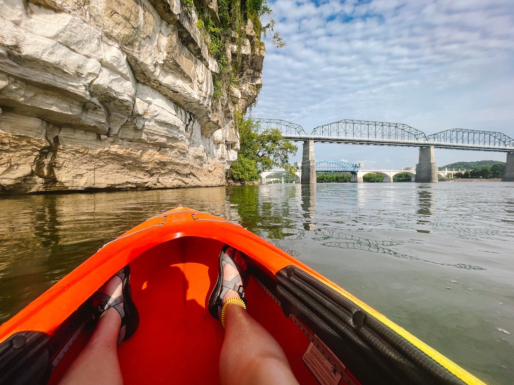 red and yellow kayak with 2 bridges-best kayaking day trips in the US
