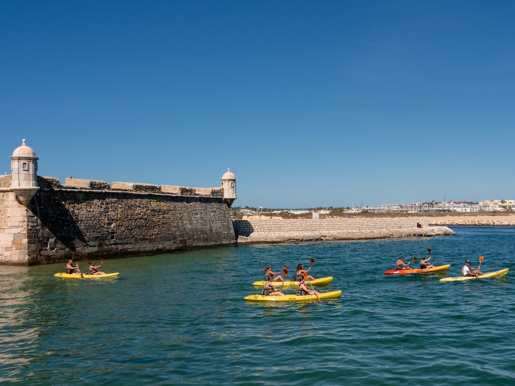 Five kayak boats on water-kayaking day trips in Europe