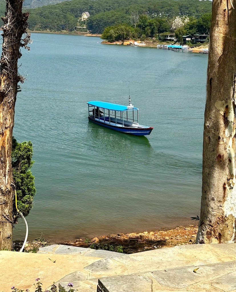 blue boat on lake