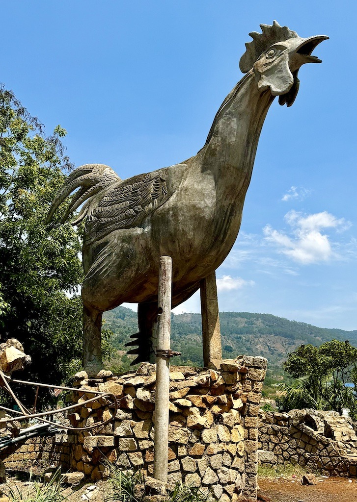 large concrete chicken statue on Easy Rider Tour