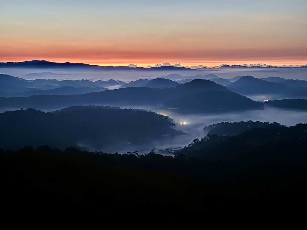 mountains with clouds and sunrise-outdoor adventures of Dalat