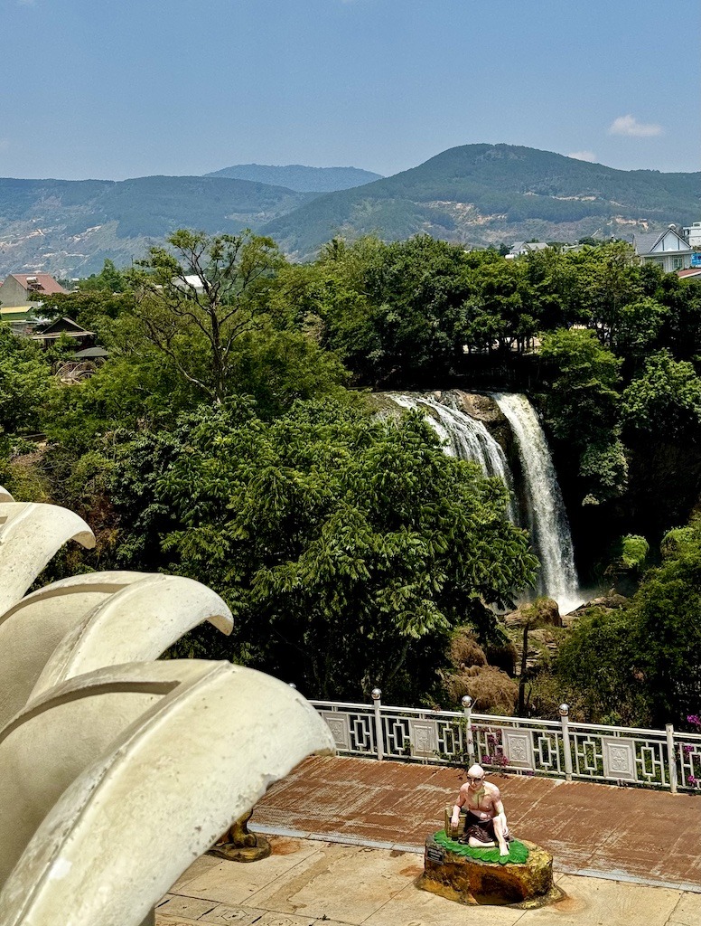 waterfall and statute on Easy Rider Tour