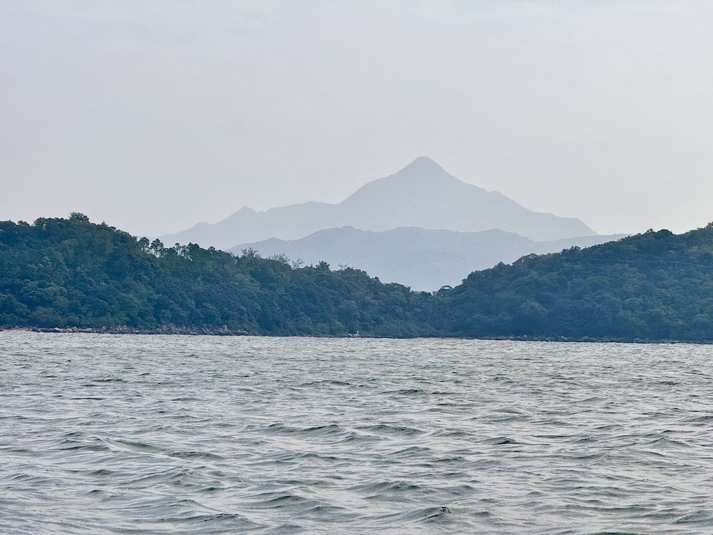 hazy mountains while kayaking in Sai Kung