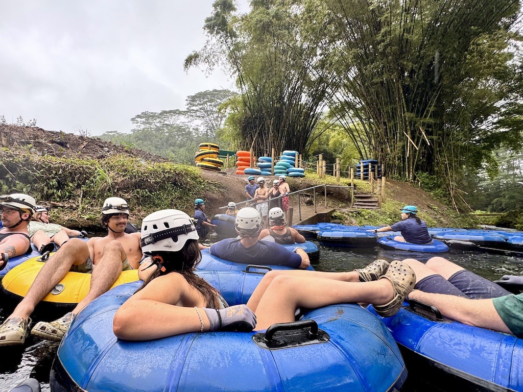 Many people in tubes waiting to start Sugarcane Plantation Tubing in Kauai