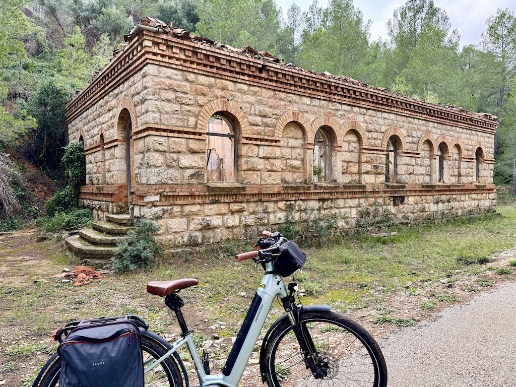 bike next to sandstone building