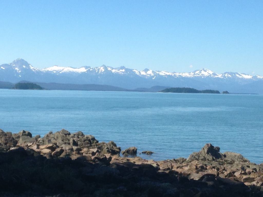 Mountains with snow -sea kayaking with whales in Alaska