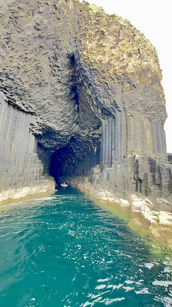 cave with blue green water-Outdoor Adventure on the Isle of Mull