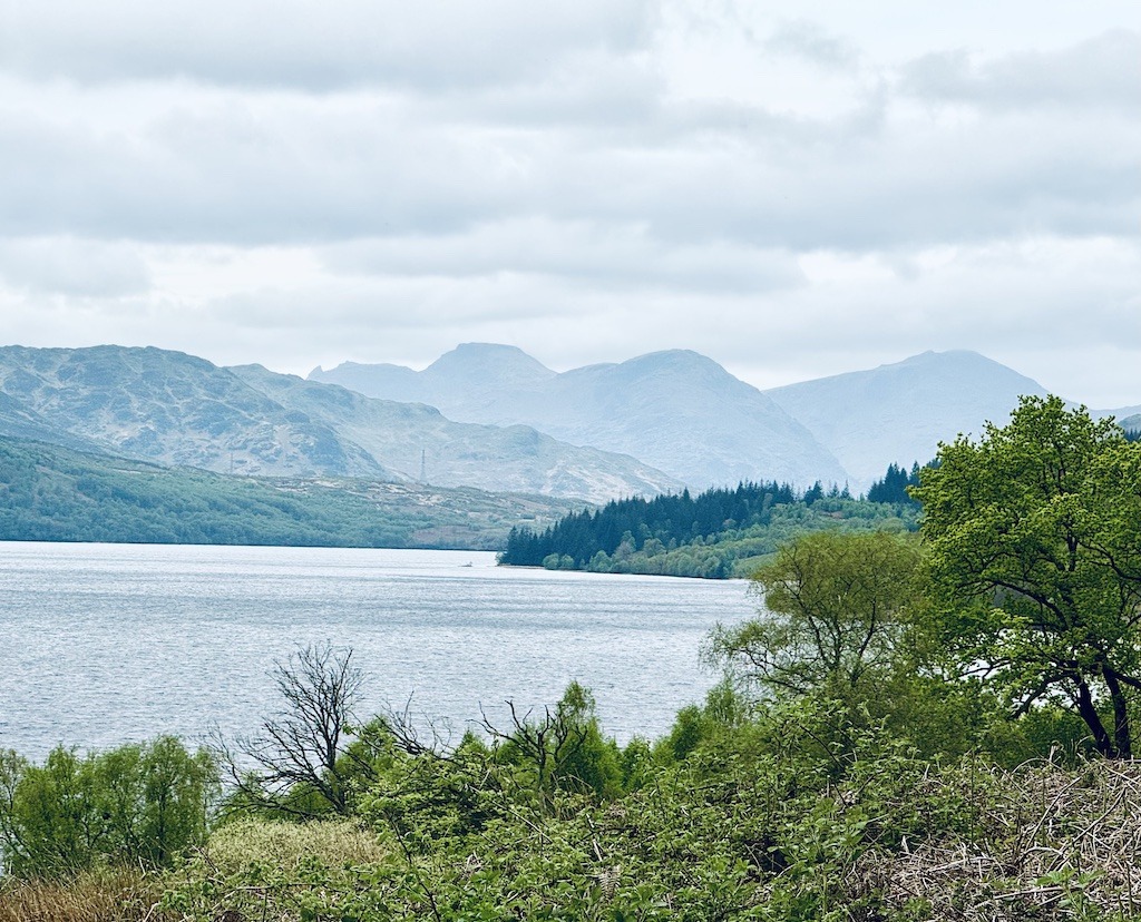 Loch and Mountains while on E-Biking Trips in Scotland