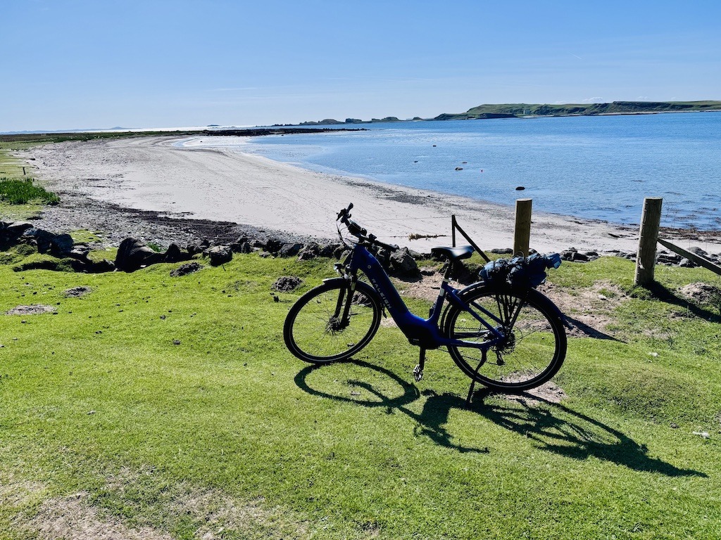 bike on a beach-outdoor adventure trip planning in Scotland