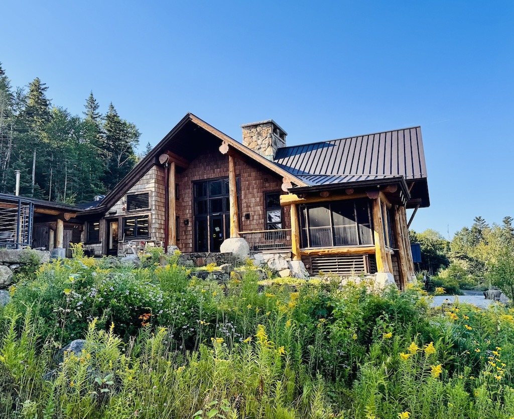 the Moosilauke Ravine Lodge with golden rod in front