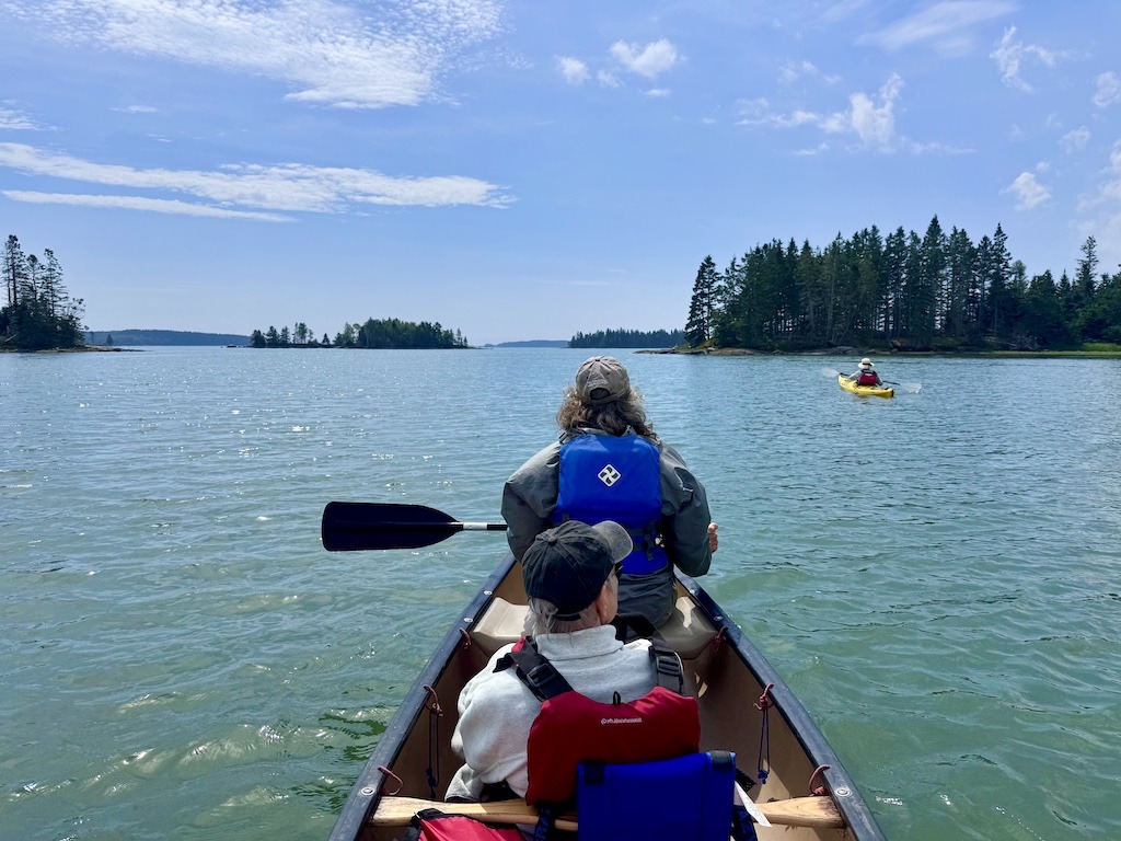 canoe and yellow kayak in ocean. Phone cases for Outdoor Adventure
