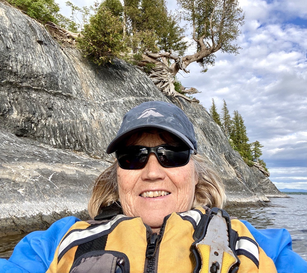 person in yellow lifejacket and gray hat. Phone cases for Outdoor Adventure