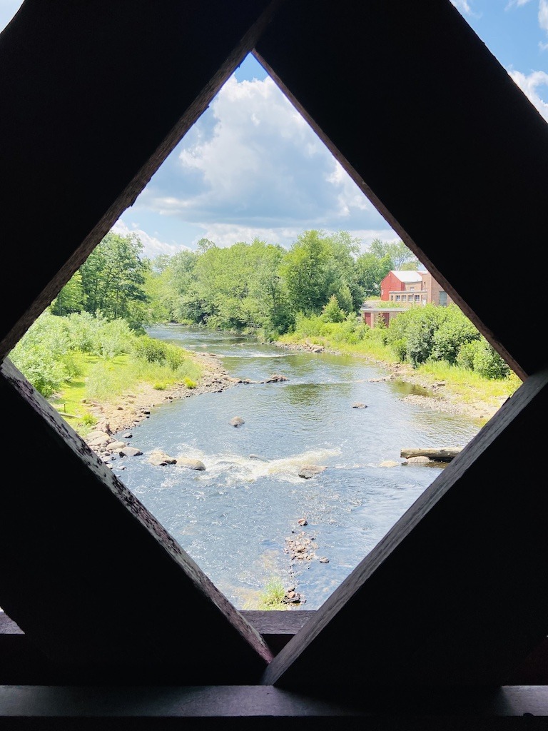 window of covered bridge while biking in Southern New Hampshire