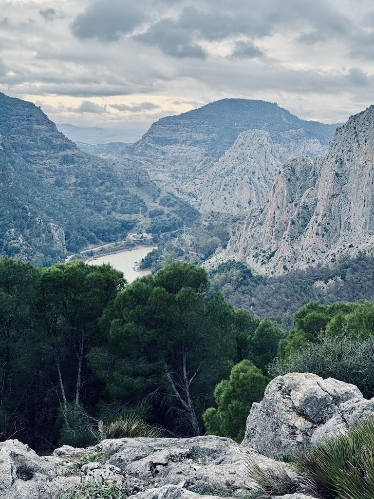 view of lake and mountain from hike while doing outdoor adventures in Andalusia