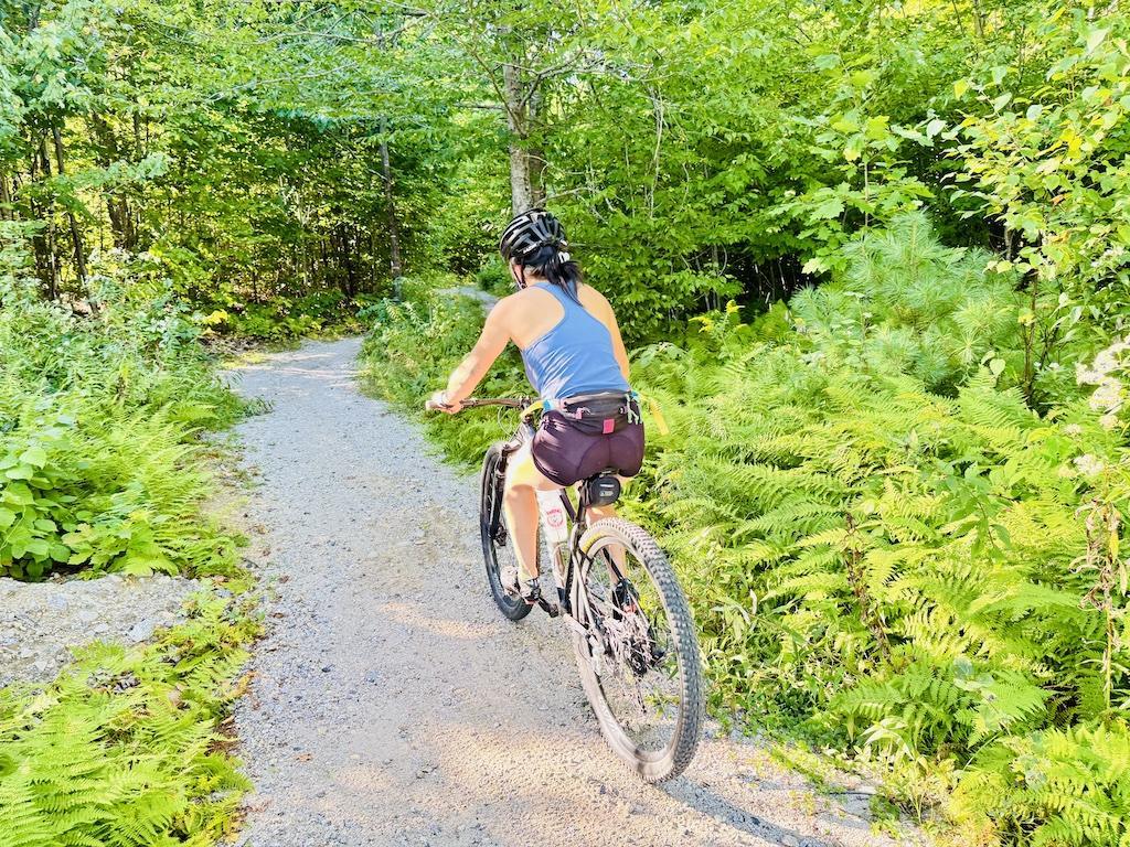 women on mountain bike- outdoor adventures in Bethel