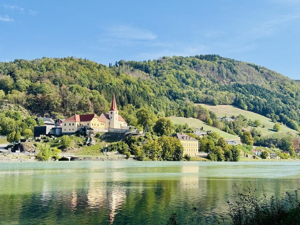 castle across the river seen while biking along the Danube River